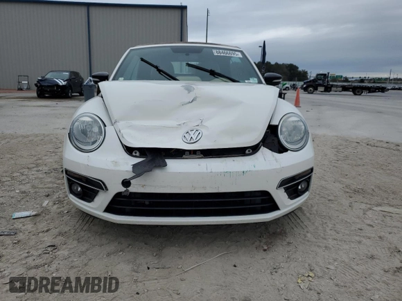 2013 Volkswagen Beetle with VIN 3VW7S7AT9DM816943, listed as a Copart auction lot 88466695 with 77,265 mi miles and Salvage Title. Bid and sale history available at DreamBid. Image 5.