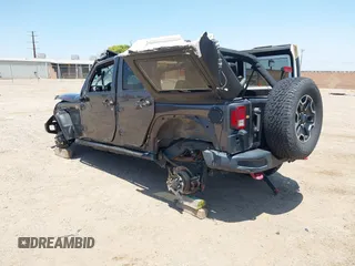 2016 Jeep Wrangler Unlimited Rubicon with VIN 1C4BJWFG7GL274673, listed as a IAAI auction lot 42532134 with 166,661 mi miles and . Bid and sale history available at DreamBid. Image 3.