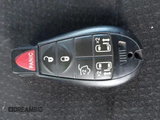 2012 Dodge Grand Caravan SXT with VIN 2C4RDGCG3CR318900, listed as a IAAI auction lot 41145958 with 201,117 mi miles and . Bid and sale history available at DreamBid. Image 11.