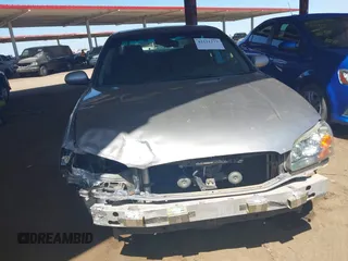2003 Nissan Maxima SE z VIN JN1DA31D43T512898, wystawiony jako IAAI lot #42111179 z przebiegiem 210 817 mil mil oraz . Historia ofert i sprzedaży dostępna na DreamBid. Obrazek 6.