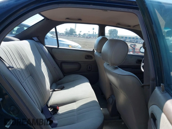 1997 Toyota Corolla with VIN 1NXBA02E7VZ601593, listed as a IAAI auction lot 42771723 with 247,823 mi miles and . Bid and sale history available at DreamBid. Image 8.