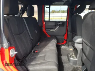 2015 Jeep Wrangler Unlimited Willys Wheeler with VIN 1C4BJWDG2FL542045, listed as a Copart auction lot 52903465 with 86,205 mi miles and Clean Title. Bid and sale history available at DreamBid. Image 10.