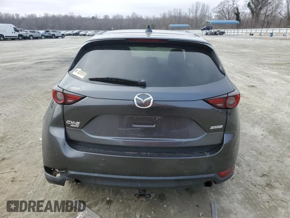2019 Mazda CX-5 Signature with VIN JM3KFBEY3K0609305, listed as a Copart auction lot 44146455 with 33,104 mi miles and Salvage Title. Bid and sale history available at carsss.com. Image 6.