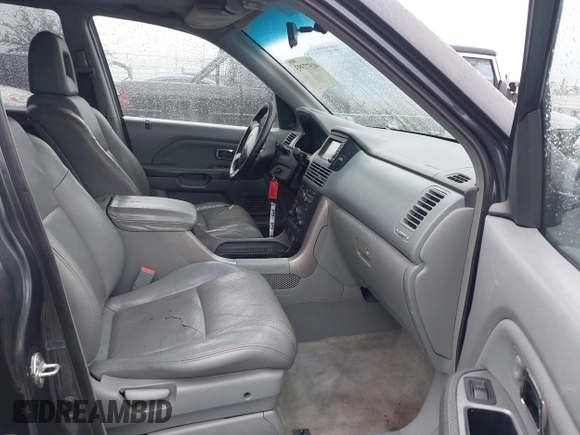 2005 Honda Pilot EX-L z VIN 2HKYF18745H567671, wystawiony jako IAAI lot #41577393 z przebiegiem 178 182 mil mil oraz . Historia ofert i sprzedaży dostępna na DreamBid. Obrazek 5.