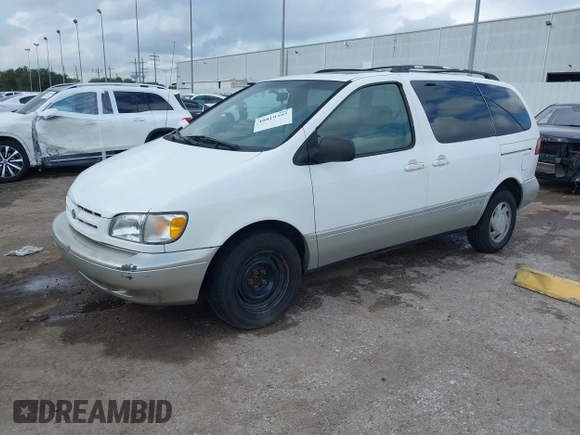1999 Toyota Sienna LE with VIN 4T3ZF13C1XU152733, listed as a IAAI auction lot 40819395 with 184,540 mi miles. Bid and sale history available at carsss.com. Image 17.