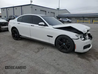 2013 BMW 7 Series 740i with VIN WBAYA6C55DC995290, listed as a Copart auction lot 82022284 with 128,882 mi miles and Salvage Title. Bid and sale history available at carsss.com. Image 4.
