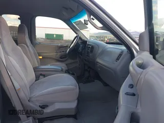 1998 Ford F-150 with VIN 2FTZX18W5WCA42375, listed as a IAAI auction lot 41724649 with 71,034 mi miles and . Bid and sale history available at DreamBid. Image 5.