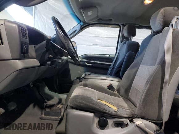 2003 Ford F-250 XL with VIN 1FTNX21L53EA55296, listed as a Copart auction lot 48673225 with 260,764 mi miles and Salvage title. Bid and sale history available at DreamBid. Image 7.