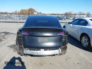 2022 Tesla Model Y Long Range with VIN 7SAYGDEEXNF424856, listed as a IAAI auction lot 41059718 with 44,439 mi miles and . Bid and sale history available at carsss.com. Image 17.