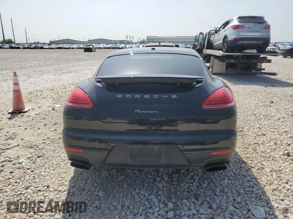 2016 Porsche Panamera 4 z VIN WP0AA2A75GL002442, wystawiony jako Copart lot #50608145 z przebiegiem 57 217 mil mil oraz Szkoda całkowita • Salvage title. Historia ofert i sprzedaży dostępna na DreamBid. Obrazek 6.