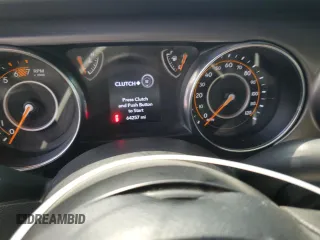 2023 Jeep Wrangler Sport with VIN 1C4HJXDGXPW596127, listed as a Copart auction lot 65395655 with 64,257 mi miles and Salvage title. Bid and sale history available at DreamBid. Image 9.
