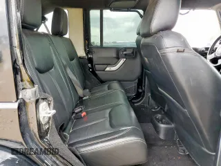 2015 Jeep Wrangler Unlimited Rubicon Hard Rock with VIN 1C4HJWFG1FL710264, listed as a Copart auction lot 54123285 with 96,737 mi miles and Salvage title. Bid and sale history available at DreamBid. Image 11.