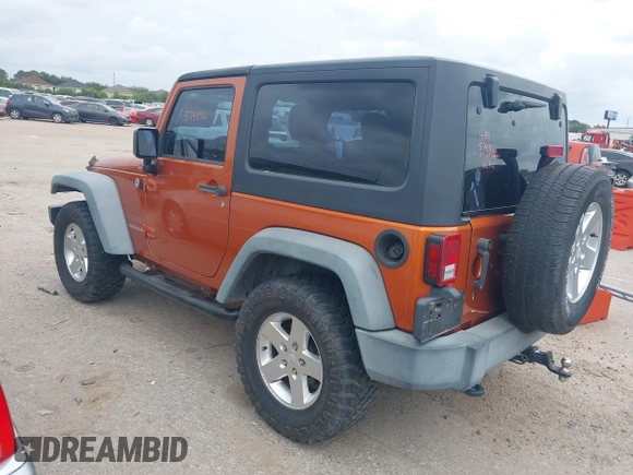 2011 Jeep Wrangler Sport with VIN 1J4AA2D1XBL579882, listed as a IAAI auction lot 42122353 with 153,885 mi miles and . Bid and sale history available at carsss.com. Image 3.