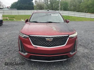 2021 Cadillac XT6 Premium Luxury with VIN 1GYKPDRSXMZ231922, listed as a Copart auction lot 51981065 with 16,784 mi miles and Salvage Title. Bid and sale history available at carsss.com. Image 5.