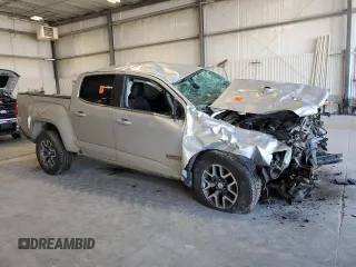 2015 GMC Canyon 4WD SLE with VIN 1GTG6BE36F1263317, listed as a Copart auction lot 53967805 with 129,590 mi miles and Salvage title. Bid and sale history available at DreamBid. Image 4.