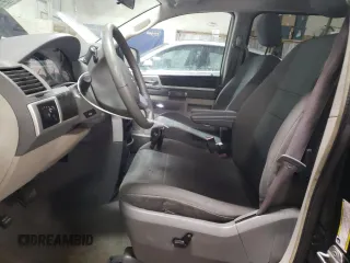 2010 Dodge Grand Caravan SXT with VIN 2D4RN5D15AR140564, listed as a Copart auction lot 52735825 with 187,744 mi miles and Salvage Title. Bid and sale history available at DreamBid. Image 7.