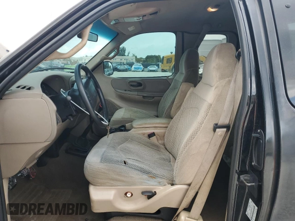 2000 Ford F-150 XL with VIN 1FTZX1721YNC09536, listed as a Copart auction lot 52645405 with 120,638 mi miles and Salvage Title. Bid and sale history available at carsss.com. Image 7.
