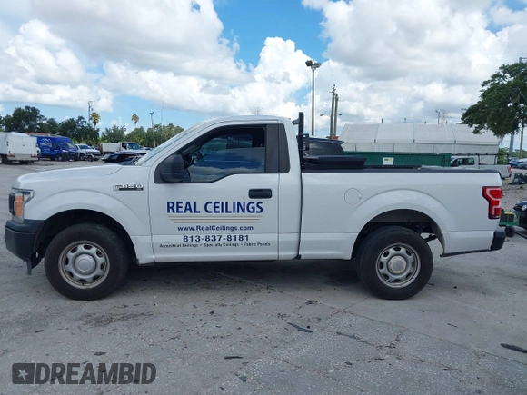 2018 Ford F-150 XL with VIN 1FTMF1CB0JFE21234, listed as a IAAI auction lot 42605399 with 243,035 mi miles and . Bid and sale history available at DreamBid. Image 14.