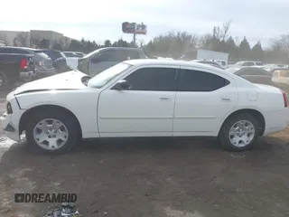 2007 Dodge Charger with VIN 2B3KA43RX7H847171, listed as a IAAI auction lot 41198098 with 157,985 mi miles and . Bid and sale history available at DreamBid. Image 14.