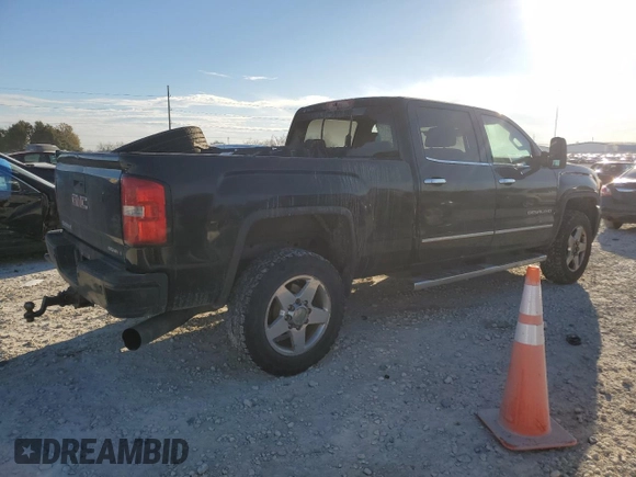 2015 GMC Sierra 2500HD Denali z VIN 1GT120E89FF153186, wystawiony jako Copart lot #88546105 z przebiegiem 418 972 mil mil oraz Czysty tytuł • Clean title. Historia ofert i sprzedaży dostępna na DreamBid. Obrazek 3.