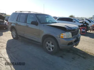 2002 Ford Explorer XLT with VIN 1FMZU73W82ZC03698, listed as a Copart auction lot 74217434 with 231,543 mi miles and Salvage title. Bid and sale history available at DreamBid. Image 4.