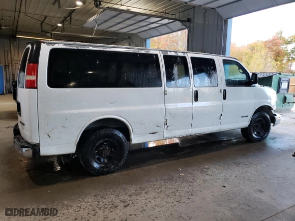 2004 Chevrolet Express Passenger with VIN 1GAHG39U341239136, listed as a Copart auction lot 74370344 with 217,839 mi miles and Salvage Title. Bid and sale history available at carsss.com. Image 3.