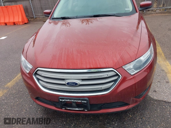 2014 Ford Taurus SEL with VIN 1FAHP2E86EG146478, listed as a IAAI auction lot 42131865 with 124,204 mi miles and . Bid and sale history available at DreamBid. Image 6.