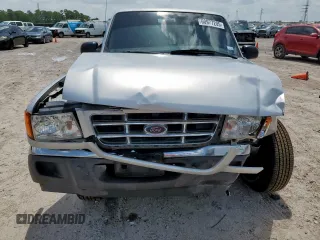 2001 Ford Ranger XL with VIN 1FTYR14V01PB46542, listed as a Copart auction lot 60977205 with 230,933 mi miles and Salvage title. Bid and sale history available at DreamBid. Image 5.