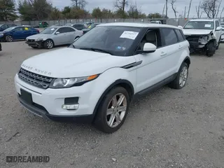 2015 Land Rover Range Rover Evoque Pure Plus with VIN SALVP2BG5FH964975, listed as a IAAI auction lot 41714227 with 100,315 mi miles. Bid and sale history available at carsss.com. Image 18.