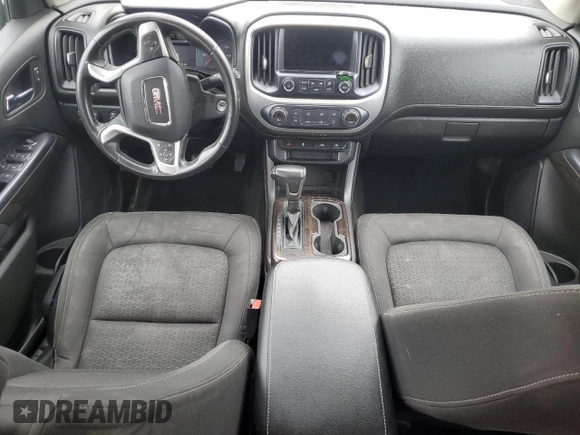 2016 GMC Canyon 4WD SLE z VIN 1GTG6CE38G1303839, wystawiony jako Copart lot #57387295 z przebiegiem 87 945 mil mil oraz Nie do naprawy. Historia ofert i sprzedaży dostępna na DreamBid. Obrazek 8.