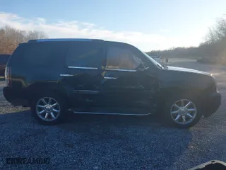 2008 GMC Yukon Denali with VIN 1GKFK63858J134120, listed as a IAAI auction lot 41126138 with 161,794 mi miles. Bid and sale history available at carsss.com. Image 13.