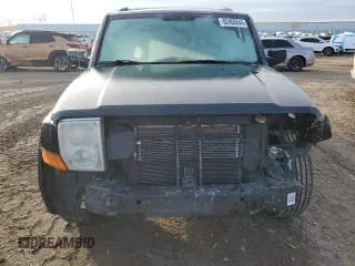 2010 Jeep Commander Limited with VIN 1J4RG5GT6AC113462, listed as a Copart auction lot 82400044 with 189,168 mi miles and Salvage title. Bid and sale history available at DreamBid. Image 5.