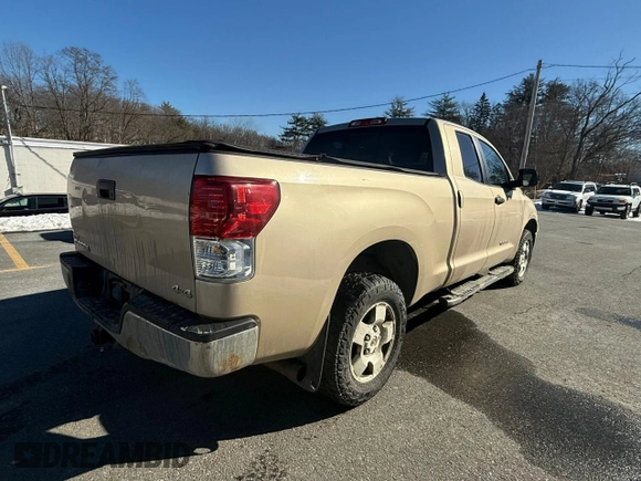 2010 Toyota Tundra 4WD Truck with VIN 5TFUM5F17AX015056, listed as a Copart auction lot 43661875 with 186,345 mi miles and Clean Title. Bid and sale history available at carsss.com. Image 4.