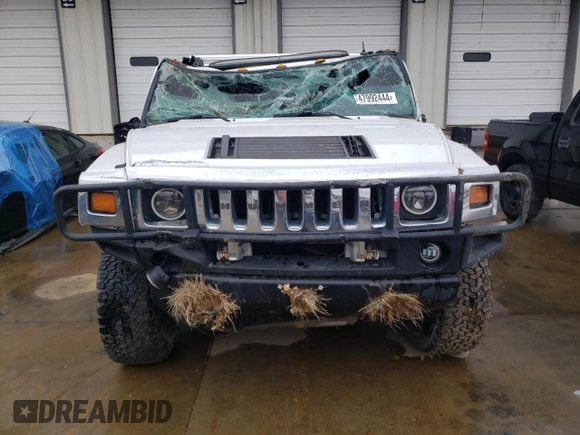 2003 Hummer H2 with VIN 5GRGN23U43H128269, listed as a Copart auction lot 47992444 with 153,360 mi miles and Salvage Title. Bid and sale history available at carsss.com. Image 5.