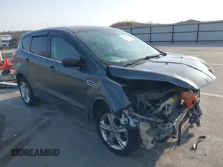 2015 Ford Escape SE with VIN 1FMCU0G73FUA77673, listed as a IAAI auction lot 41988290 with 176,734 mi miles. Bid and sale history available at carsss.com. Image 1.