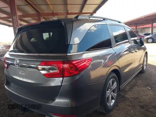 2019 Honda Odyssey EX z VIN 5FNRL6H55KB029225, wystawiony jako IAAI lot #42414004 z przebiegiem 71 265 mil mil oraz . Historia ofert i sprzedaży dostępna na DreamBid. Obrazek 4.