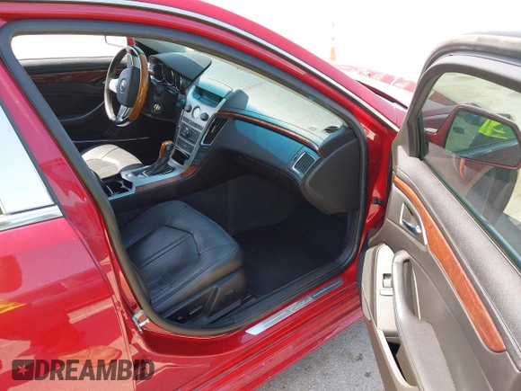2012 Cadillac CTS Performance with VIN 1G6DJ5E31C0107905, listed as a IAAI auction lot 42131940 with 108,015 mi miles and . Bid and sale history available at DreamBid. Image 5.
