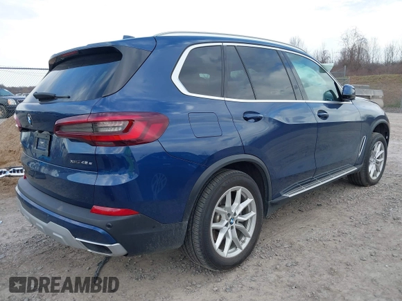 2021 BMW X5 xDrive45e with VIN 5UXTA6C07M9F32034, listed as a IAAI auction lot 41832720 with 28,453 mi miles. Bid and sale history available at carsss.com. Image 4.