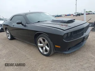 2013 Dodge Challenger R/T z VIN 2C3CDYBTXDH653559, wystawiony jako IAAI lot #42304148 z przebiegiem 84 796 mil mil oraz . Historia ofert i sprzedaży dostępna na DreamBid. Obrazek 1.