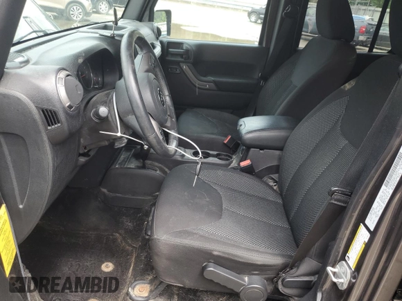 2016 Jeep Wrangler Unlimited Sport with VIN 1C4BJWDG1GL165418, listed as a Copart auction lot 61364095 with 123,772 mi miles and Salvage title. Bid and sale history available at DreamBid. Image 7.