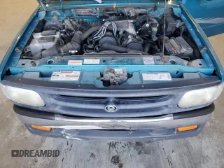 1996 Mazda B-Series 2WD Truck with VIN 4F4CR12A2TTM30539, listed as a Copart auction lot 82702234 with 115,724 mi miles and Salvage Title. Bid and sale history available at carsss.com. Image 11.