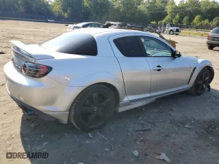 2004 Mazda RX-8 with VIN JM1FE17N040129638, listed as a Copart auction lot 72496364 with 57,966 mi miles and Salvage Title. Bid and sale history available at carsss.com. Image 3.