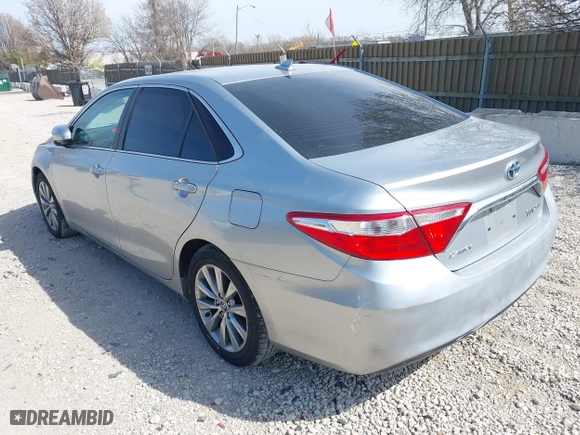 2015 Toyota Camry Hybrid LE with VIN 4T1BD1FKXFU159875, listed as a IAAI auction lot 42041323 with 240,779 mi miles. Bid and sale history available at carsss.com. Image 3.