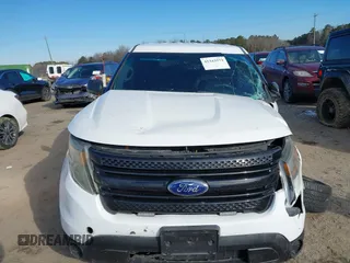 2014 Ford Police Interceptor Utility z VIN 1FM5K8AR0EGC28263, wystawiony jako IAAI lot #41343573 z przebiegiem 192 634 mil mil oraz . Historia ofert i sprzedaży dostępna na DreamBid. Obrazek 12.