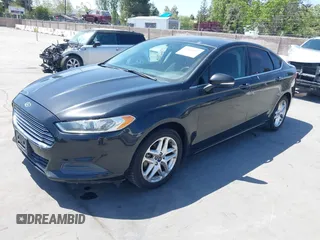 2013 Ford Fusion SE with VIN 3FA6P0H76DR312052, listed as a IAAI auction lot 42088821 with 135,761 mi miles. Bid and sale history available at carsss.com. Image 2.