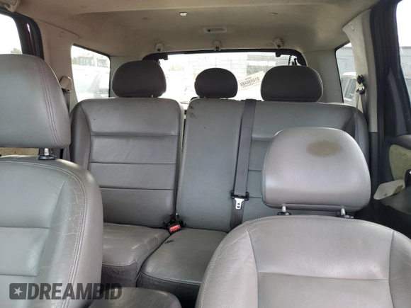 2005 Ford Escape XLT with VIN 1FMYU93125KC70077, listed as a Copart auction lot 69504824 with 152,216 mi miles and Salvage Title. Bid and sale history available at carsss.com. Image 10.