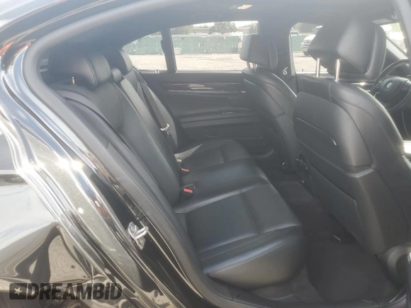 2013 BMW 7 Series 750i with VIN WBAYA8C58DC996431, listed as a Copart auction lot 70366064 with 106,580 mi miles and Salvage Title. Bid and sale history available at DreamBid. Image 11.