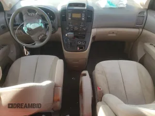2011 Kia Sedona LX with VIN KNDMG4C74B6370803, listed as a Copart auction lot 77228344 with 142,394 mi miles and Salvage Title. Bid and sale history available at carsss.com. Image 8.