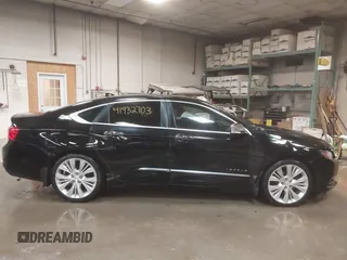 2014 Chevrolet Impala LTZ with VIN 2G1155S32E9134167, listed as a IAAI auction lot 41932703 with 196,492 mi miles and . Bid and sale history available at DreamBid. Image 13.