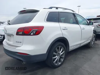 2015 Mazda CX-9 Grand Touring z VIN JM3TB2DV9F0458340, wystawiony jako IAAI lot #42021843 z przebiegiem 145 929 mil mil oraz . Historia ofert i sprzedaży dostępna na DreamBid. Obrazek 4.
